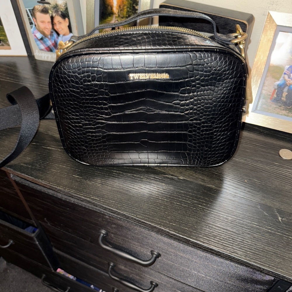 Twelvelittles crossbody baby bag